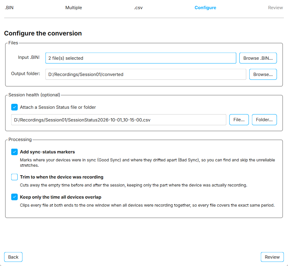 The Configure step for converting two BIN files to CSV, with a Session Status file attached and two processing options selected.
